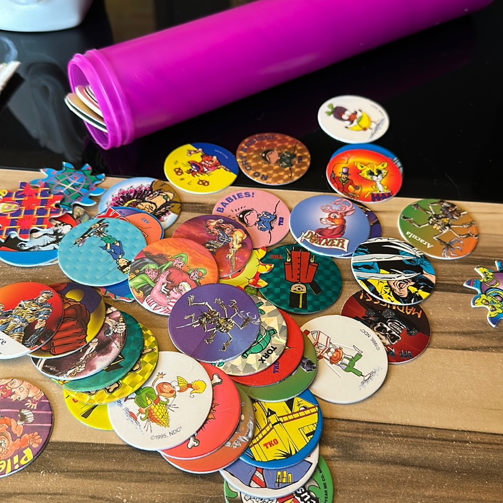 Lot of Vintage Pogs and Organizing Tube